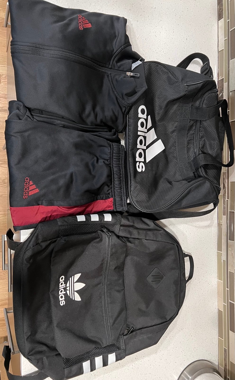 Adidas Tracksuit, Backpack, Duffel bag