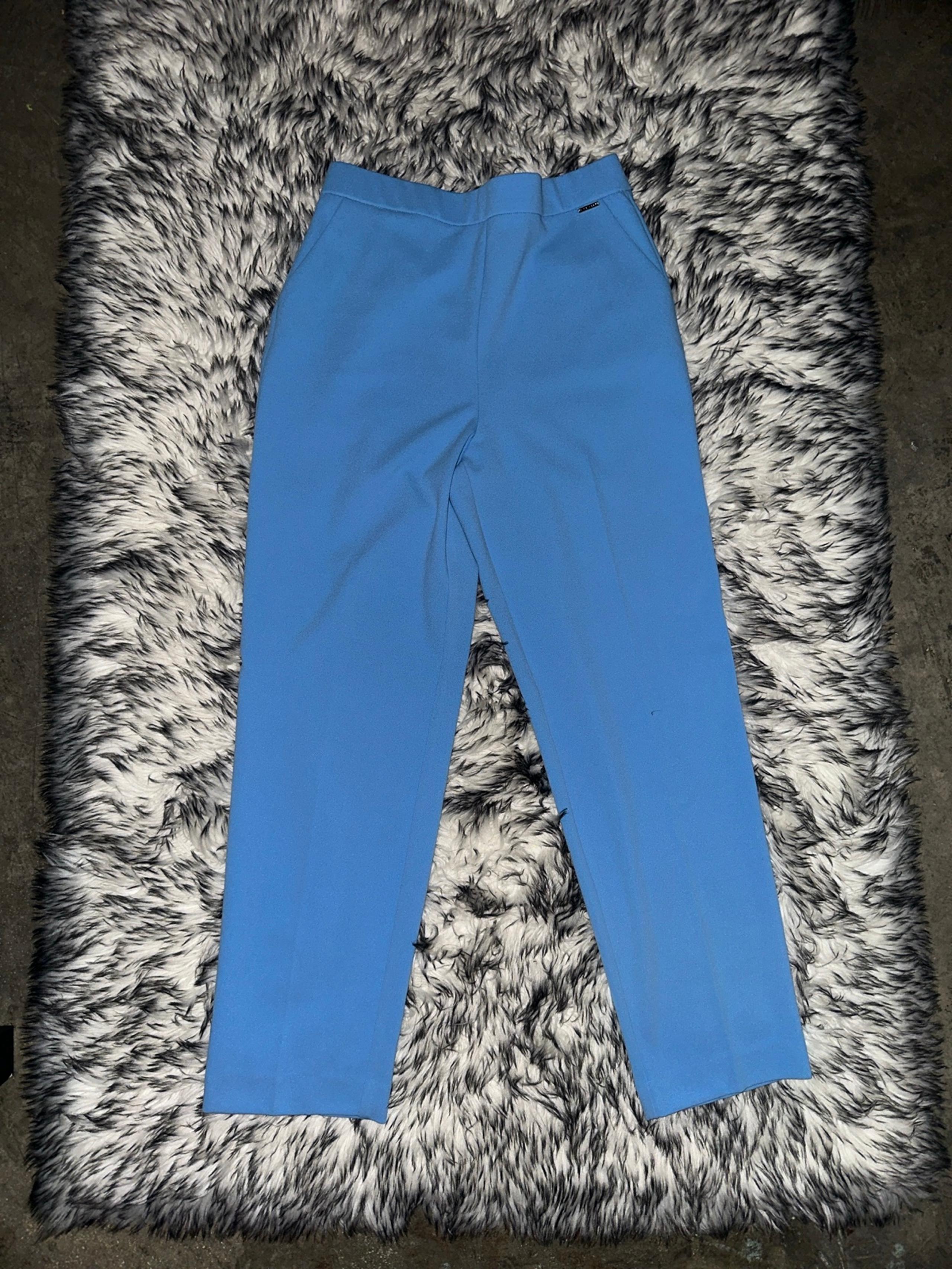 Nine West blue stretchy dressy slack pants with pockets and pleated