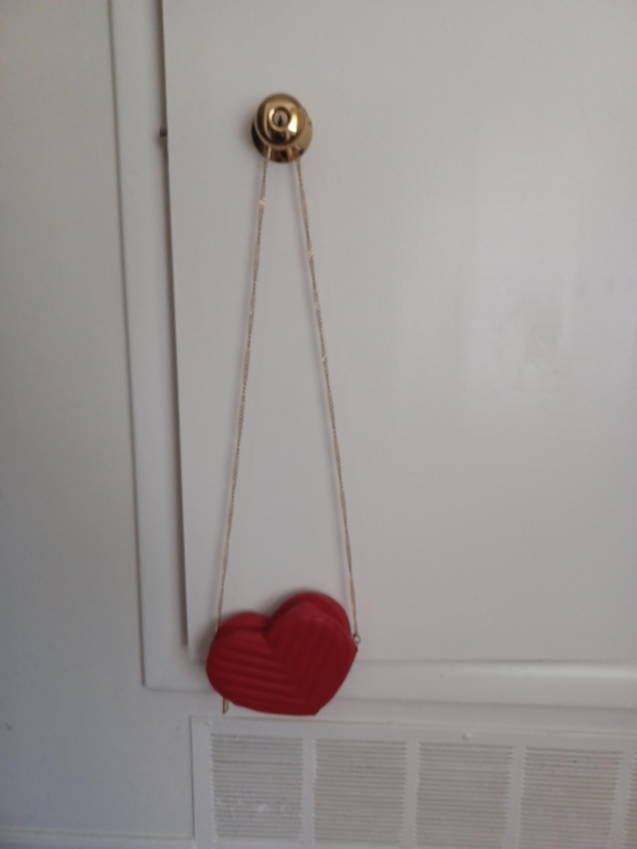 Red heart purse woth gold strap like new