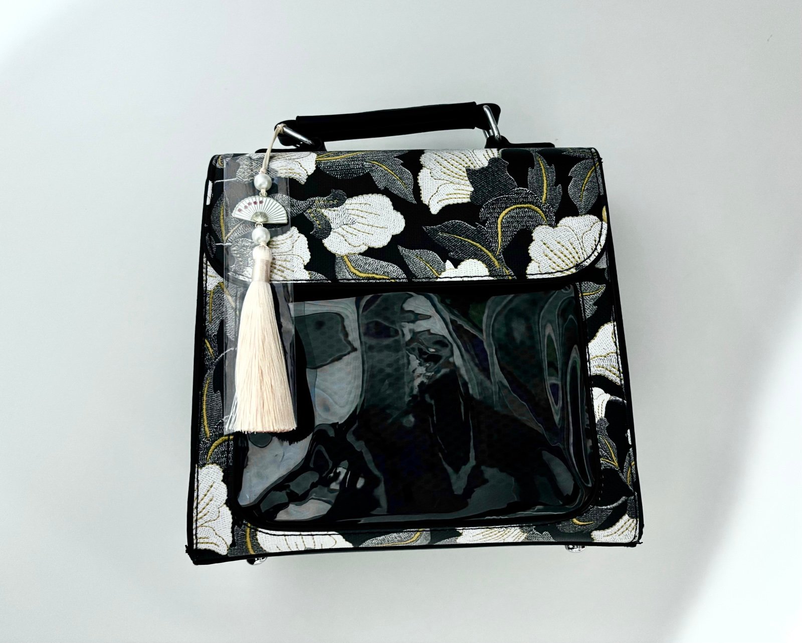 Black Floral Ita Bag with rose gold tassel