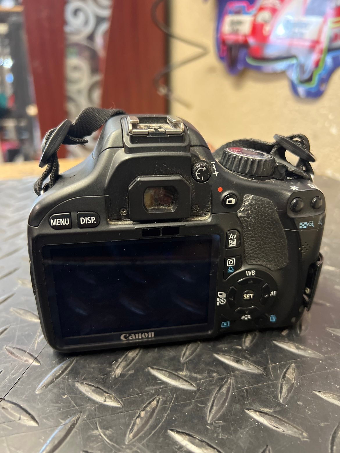 Canon EOS Rebel T2i 18 MP Digital SLR Camera - Black (Body Only).