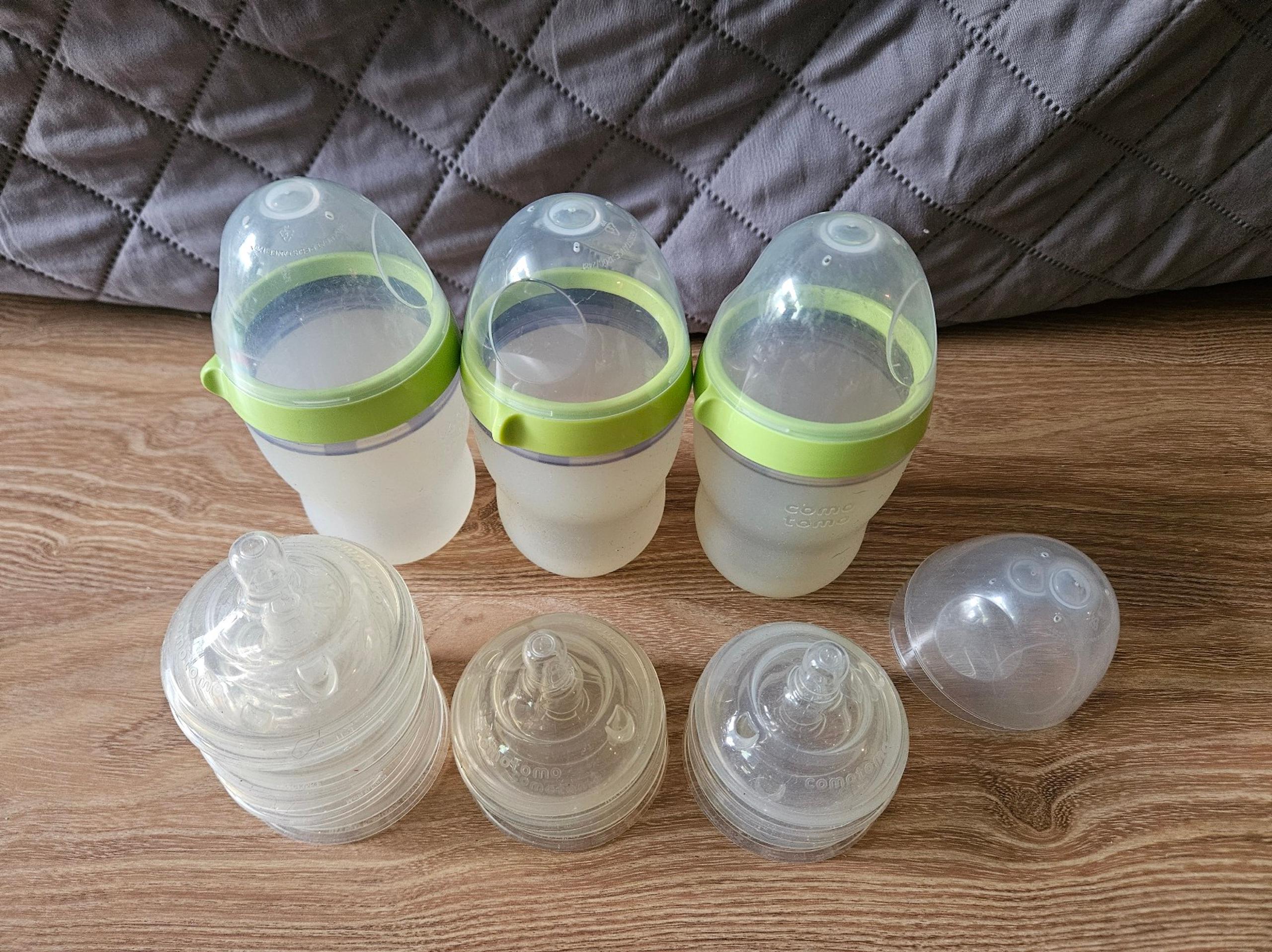 Comotomo baby bottles and nipples lot