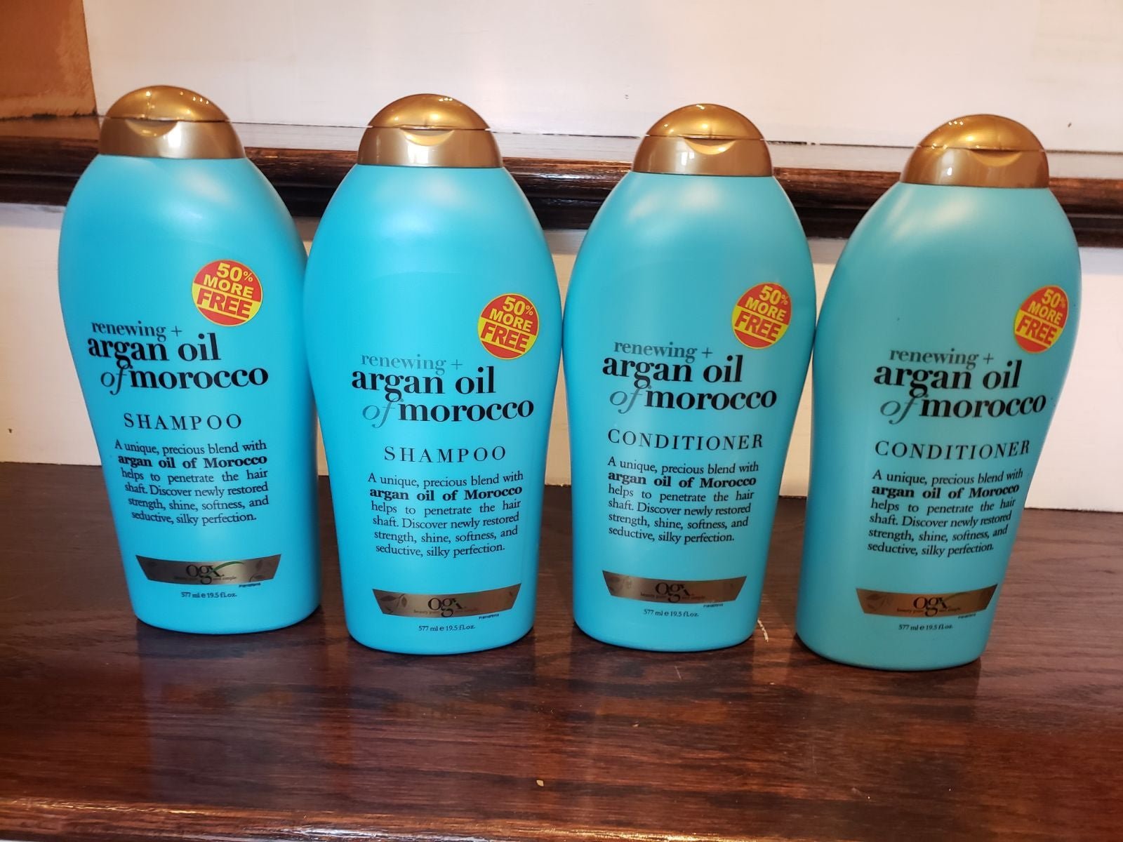4 bottles Argan oil shampoo & conditioner by OGX