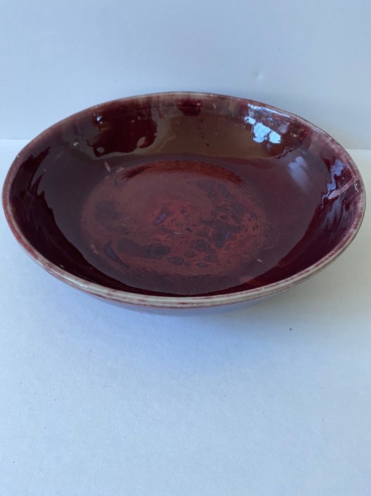 red ceramic bowl