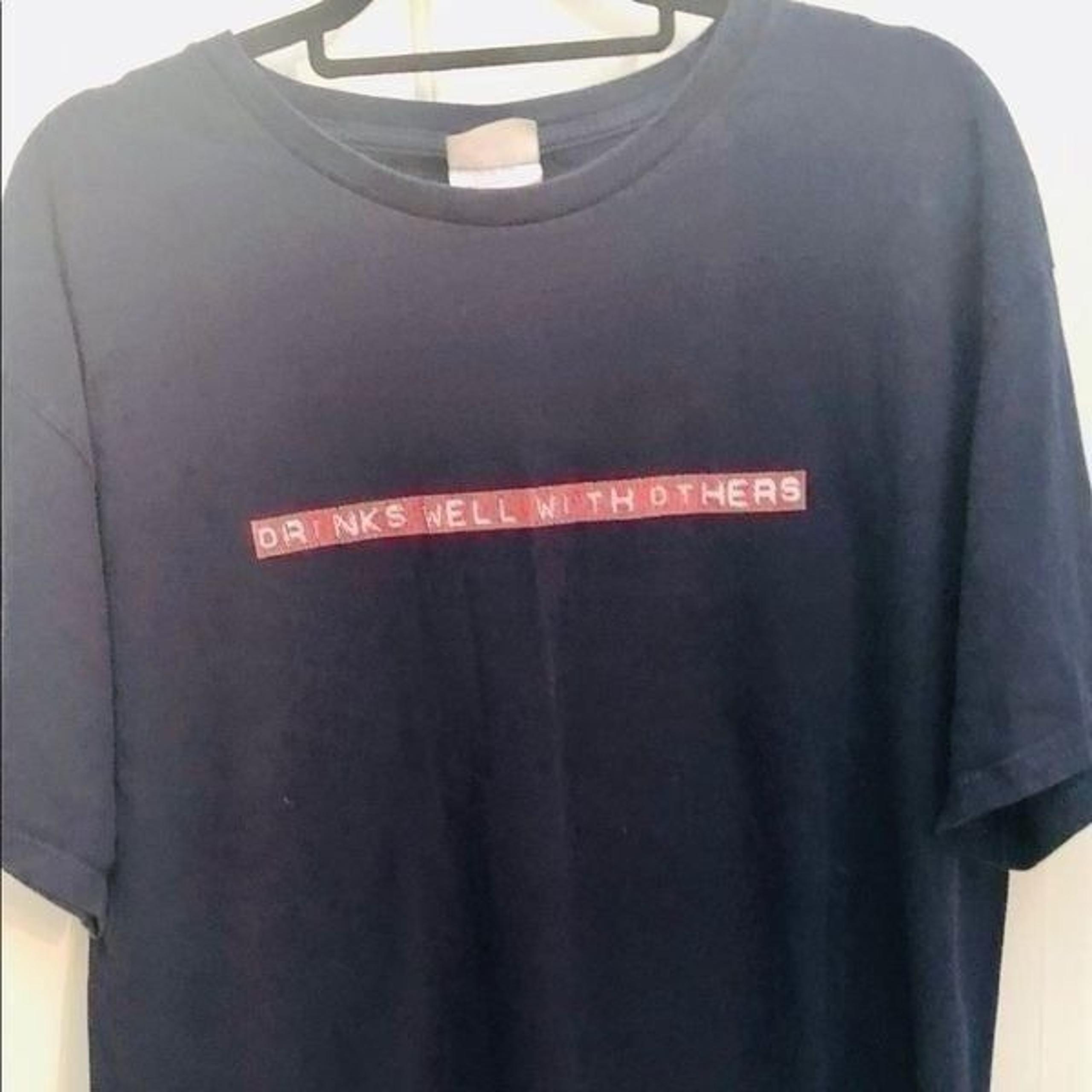 Men’s navy blue t shirt. Graphics