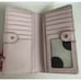 Kate Spade Madison large bi-fold wallet saffiano leather pink polka dot lining