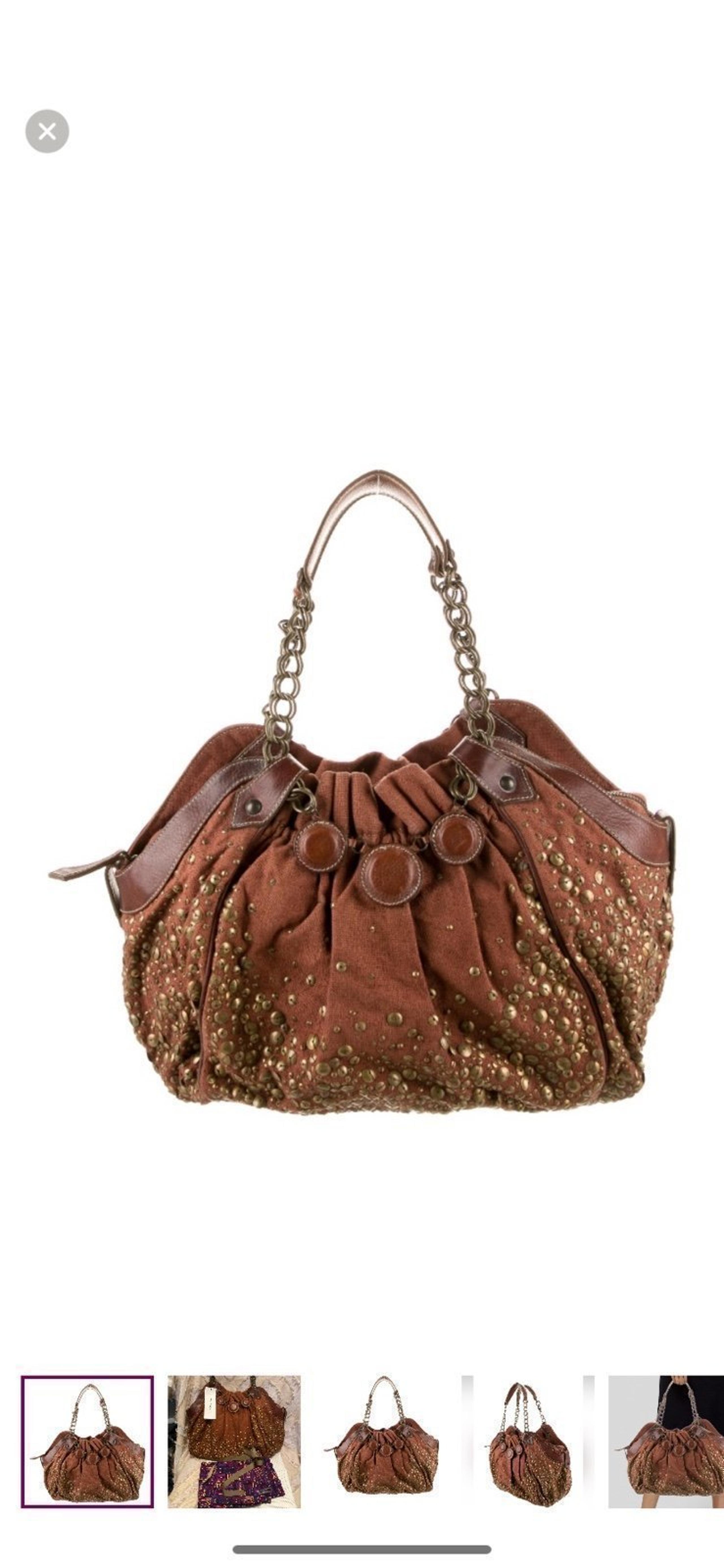 Christian Louboutin canvas leather trimmed shoulder bag. Good condition.