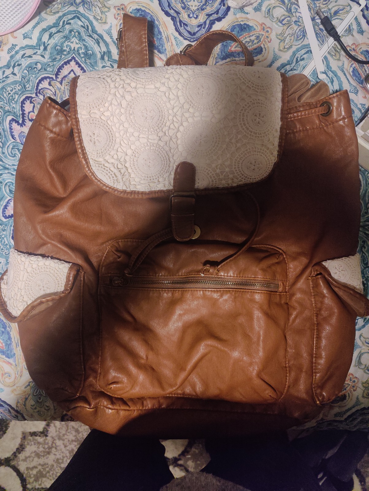 Hook and loop leather and lace backpack