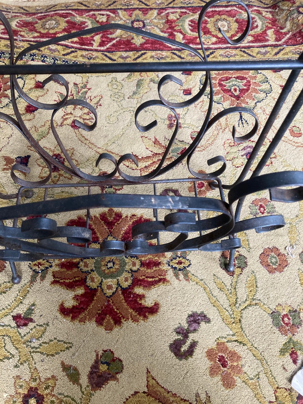 Vintage wrought iron magazine rack