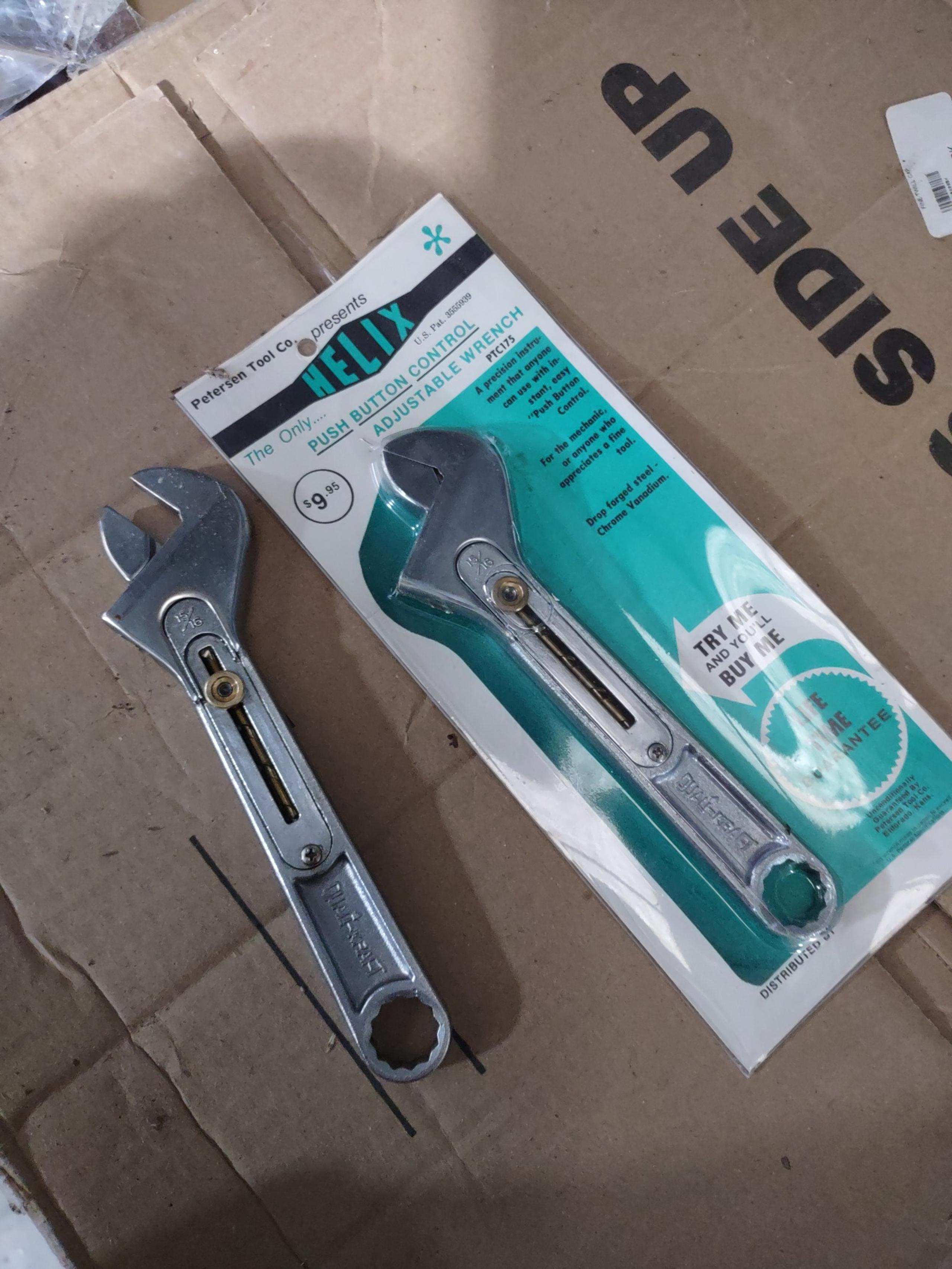 Adjustable push button wrench