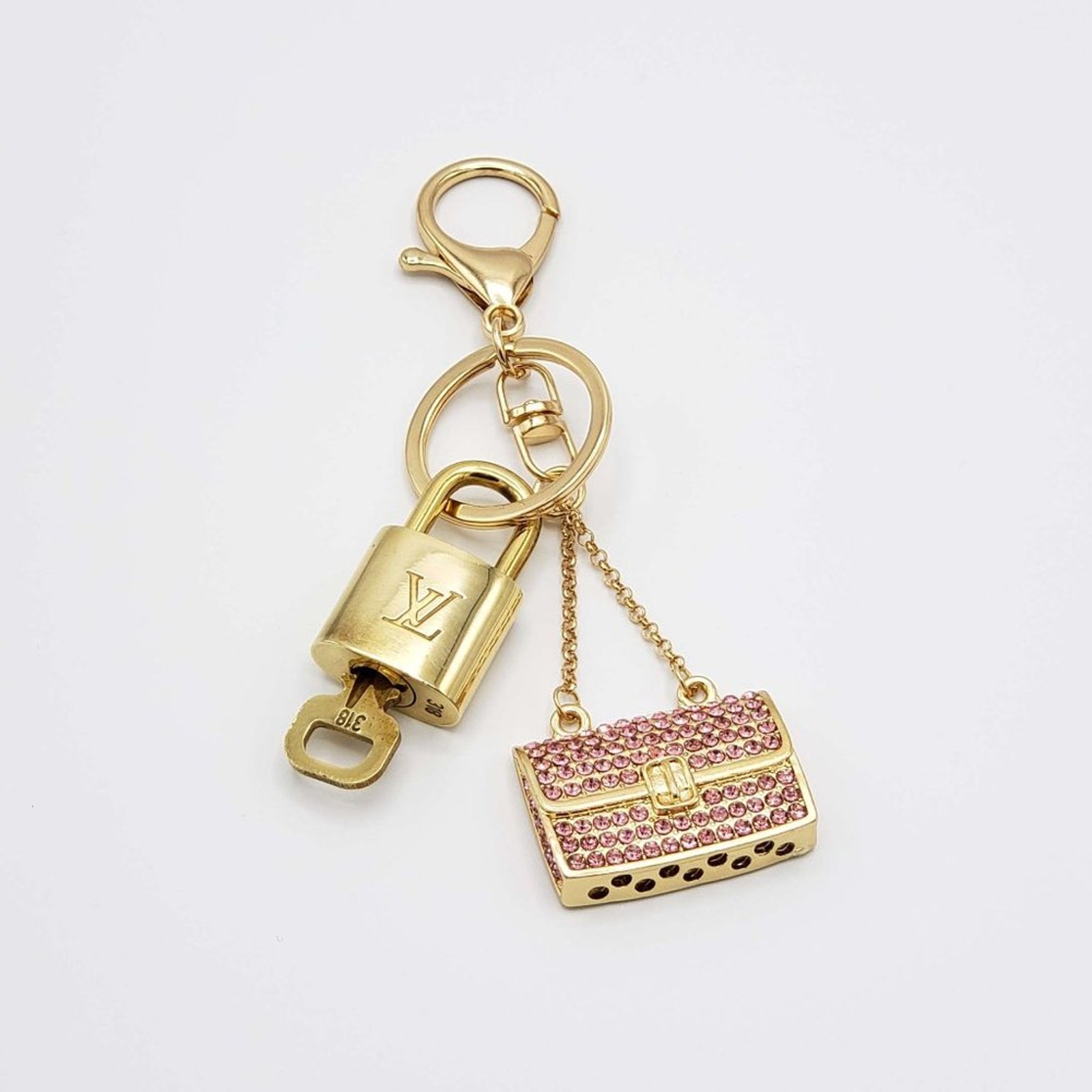 100% Auth Louis Vuitton Lock & Key with unbranded Bagcharm, Keycharm, Keychain