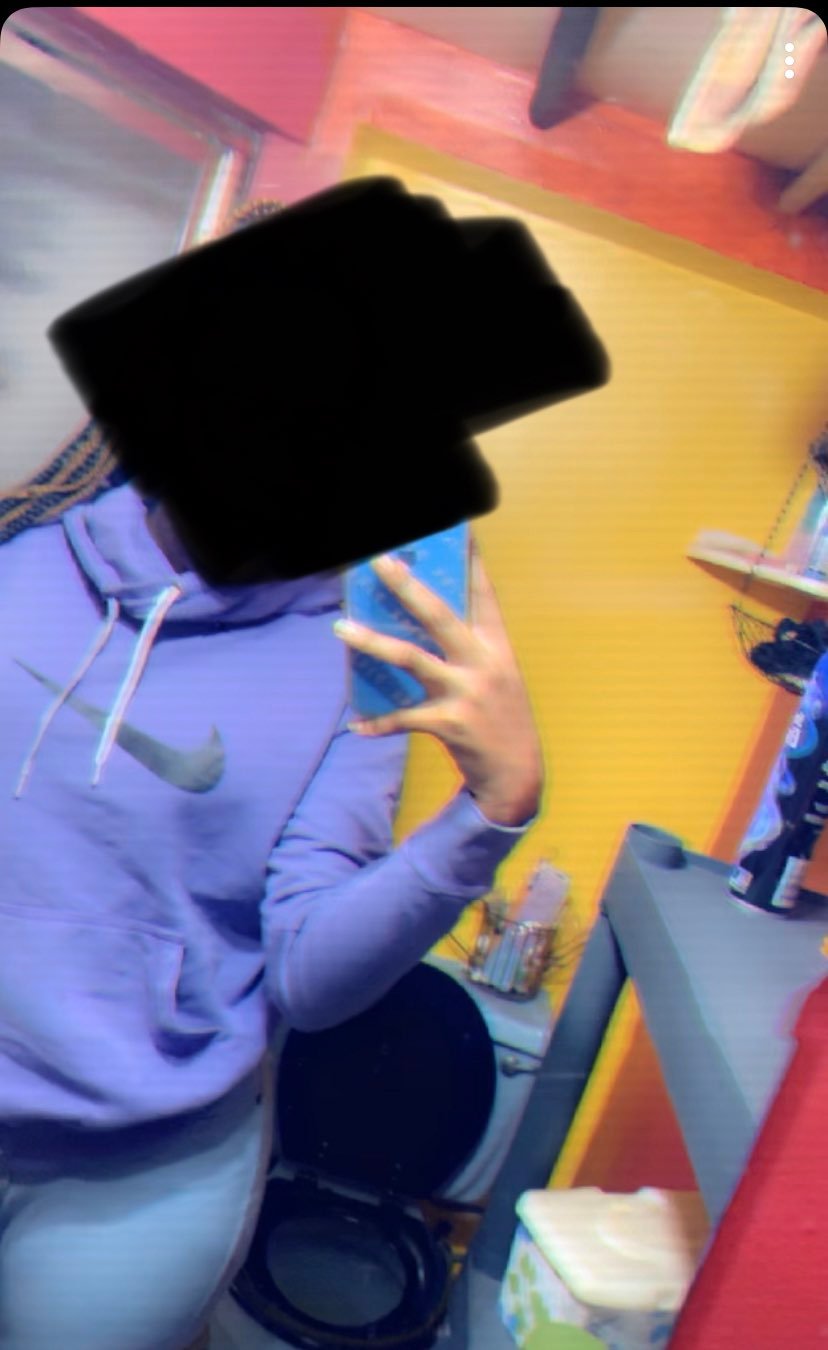 A purple nike hoodie