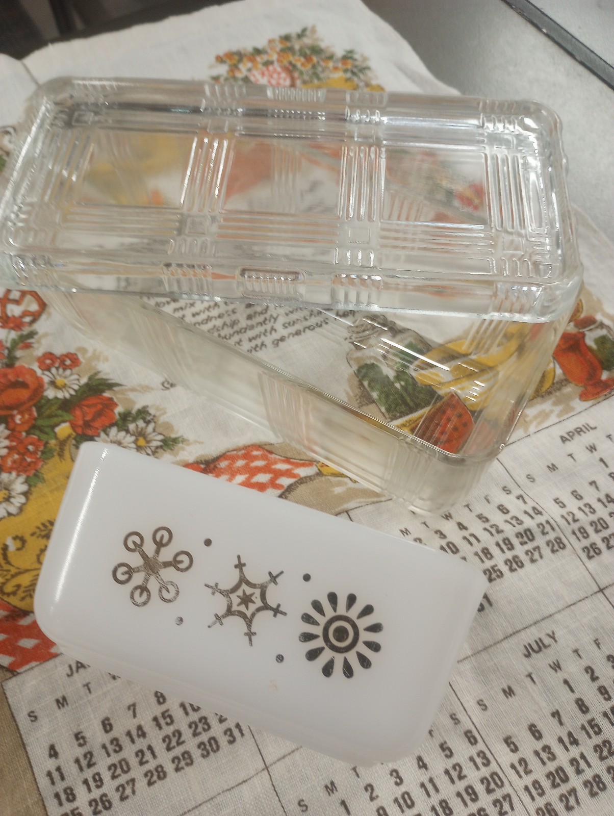 Two vintage fridgies-Glass Bake atomic star and glass lidded Criss-Cross refrig