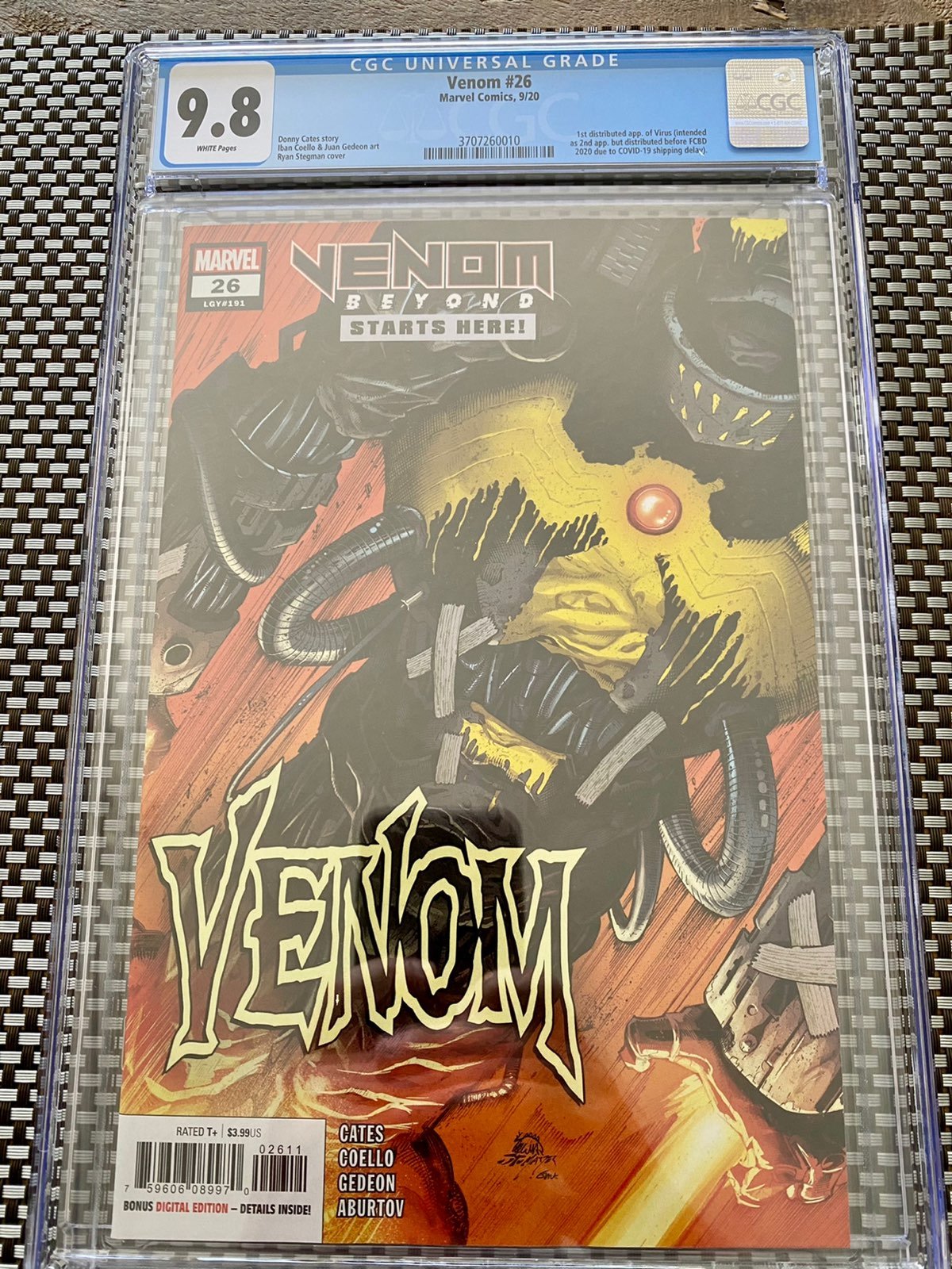 Venom 26 CGC 9.8 (1st app)