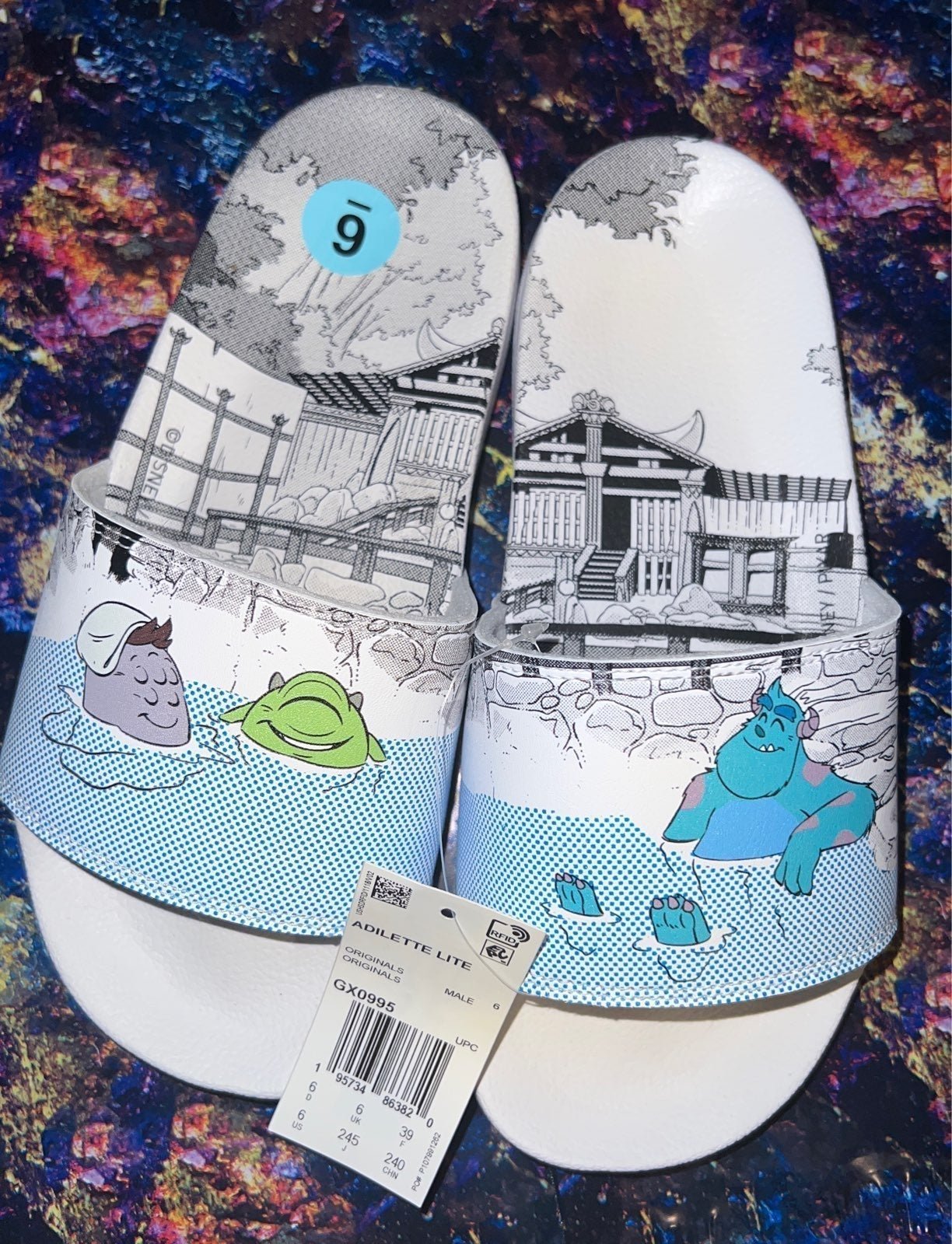 Monsters Inc Adidas slides brand new with tags/never worn. Mens size 6.