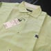 Brand new unused item with tag attached. Burberry Black Label long-sleeve shirt in green tones.