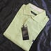 Brand new unused item with tag attached. Burberry Black Label long-sleeve shirt in green tones.