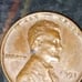 Rare 1951 error no mint ,error L on rim ,and discolor spot back of lower head