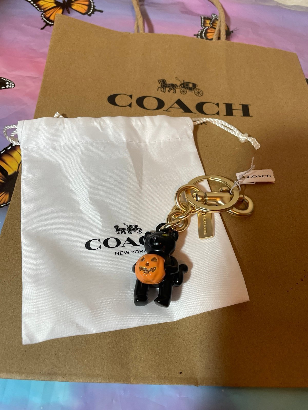 Coach bag charm