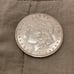 1902 Morgan dollar (Better date in higher grade) potentially polished.