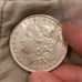1902 Morgan dollar (Better date in higher grade) potentially polished.