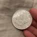 1902 Morgan dollar (Better date in higher grade) potentially polished.