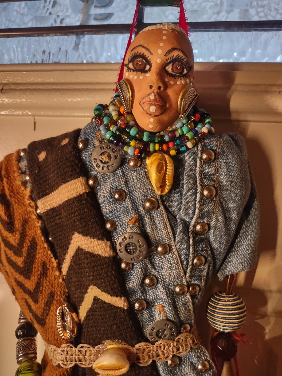 Handmade soft sculpture doll wall hanging