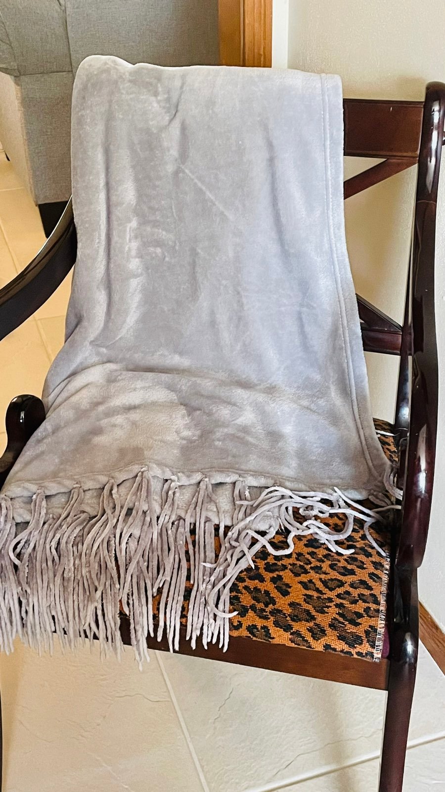 Wood chair with animal print fabric