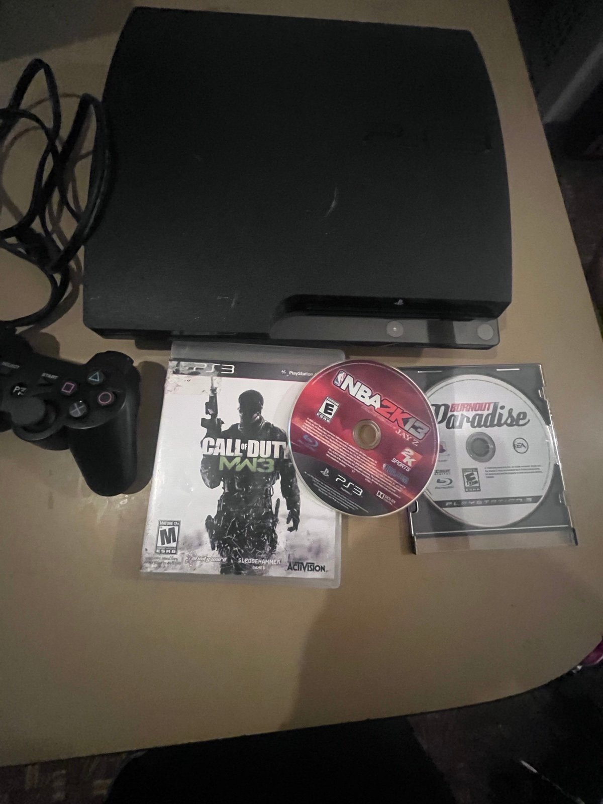 PS3 slim 120 gig w control and games