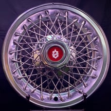 Oldsmobile Omega Emblem Wire Hubcap