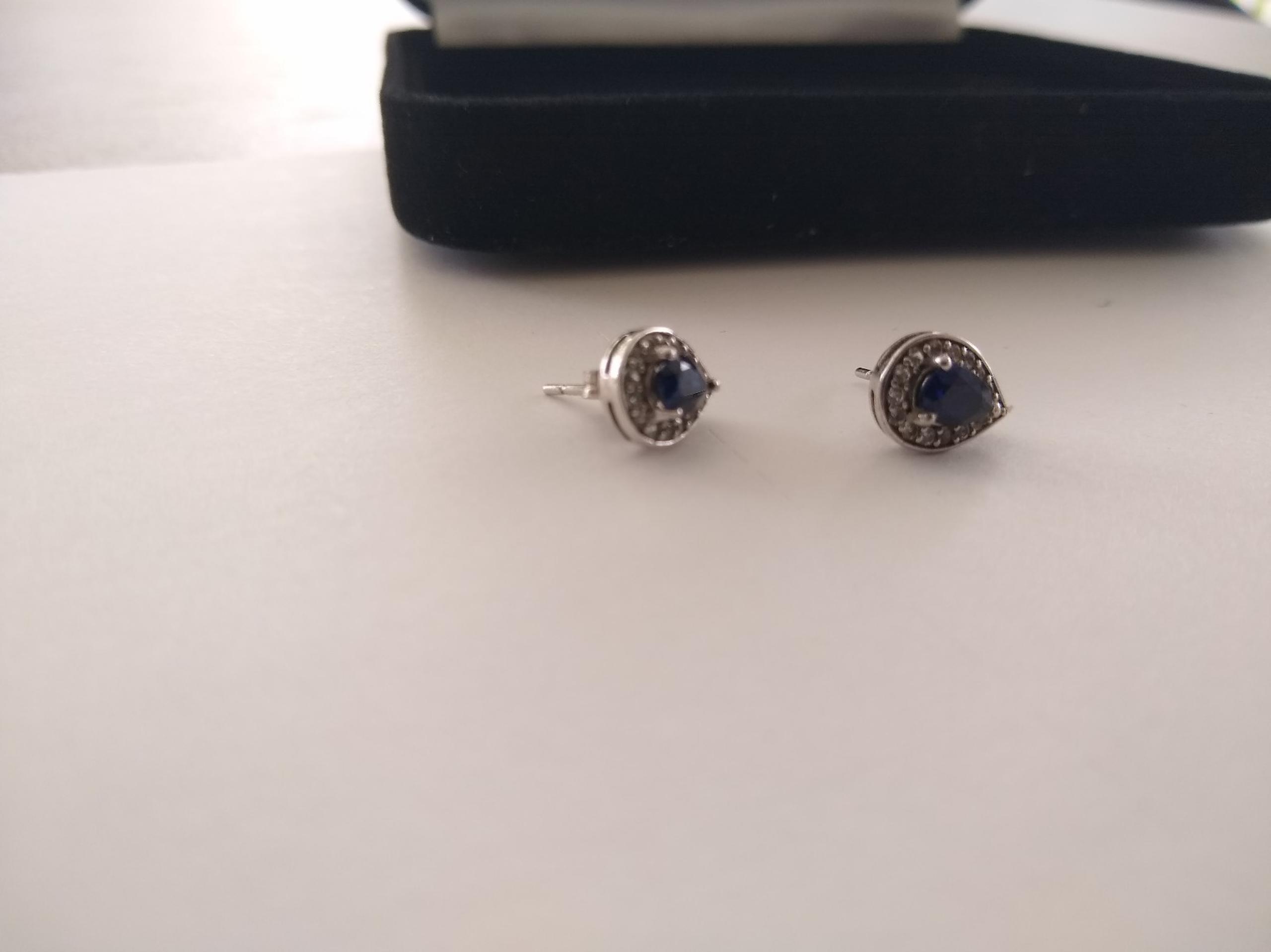 NEW 925 Sterling Silver Sapphire Earrings 
Teardrop shaped Lab Created Sapphire