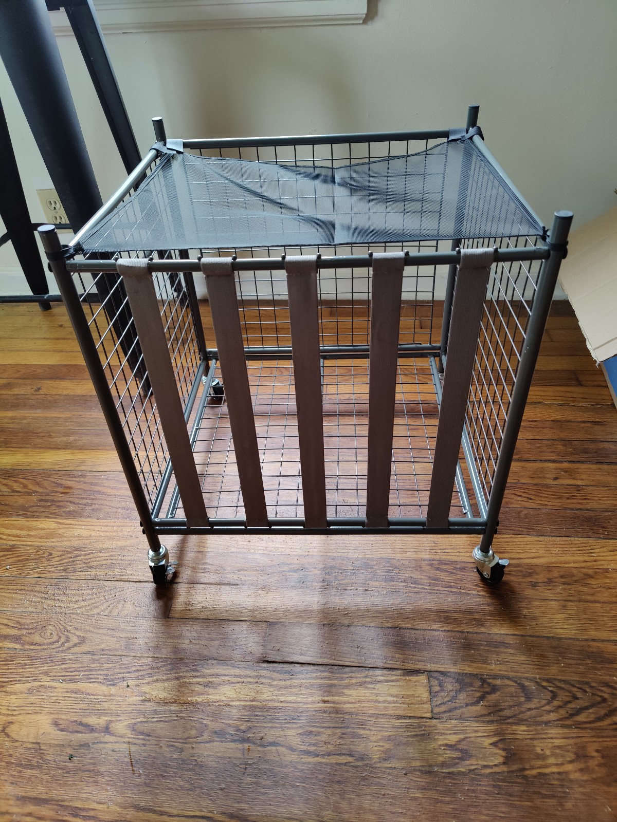 Sports storage bin with wheels
