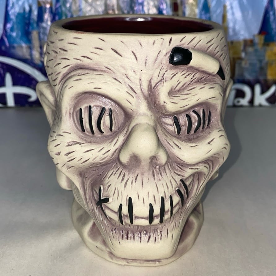 Disney parks trader Sam’s zombie shrunken head 4th edition mug