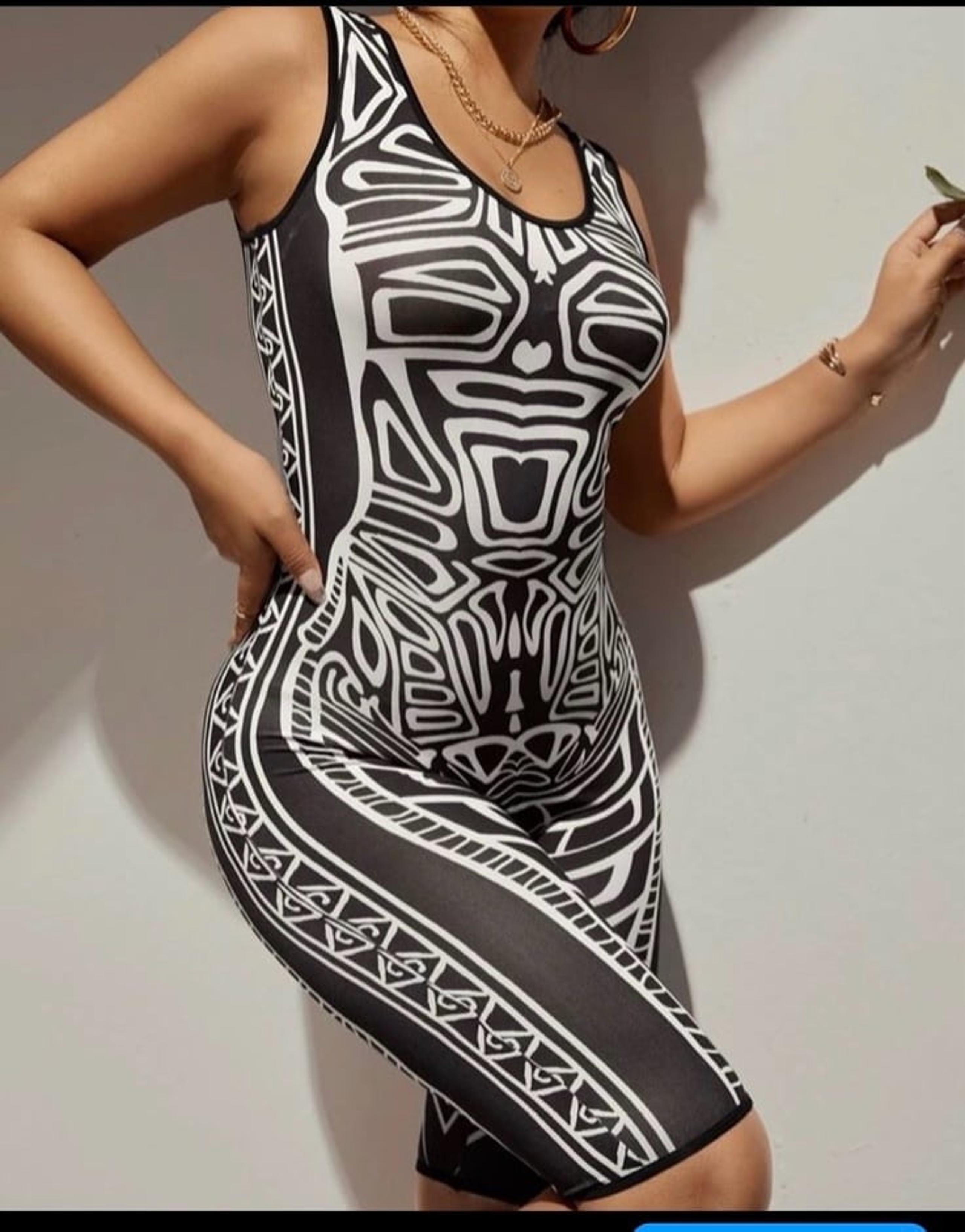 Black and white jump suit size s