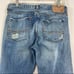 American Eagle distressed plaid patch jeans 30/32