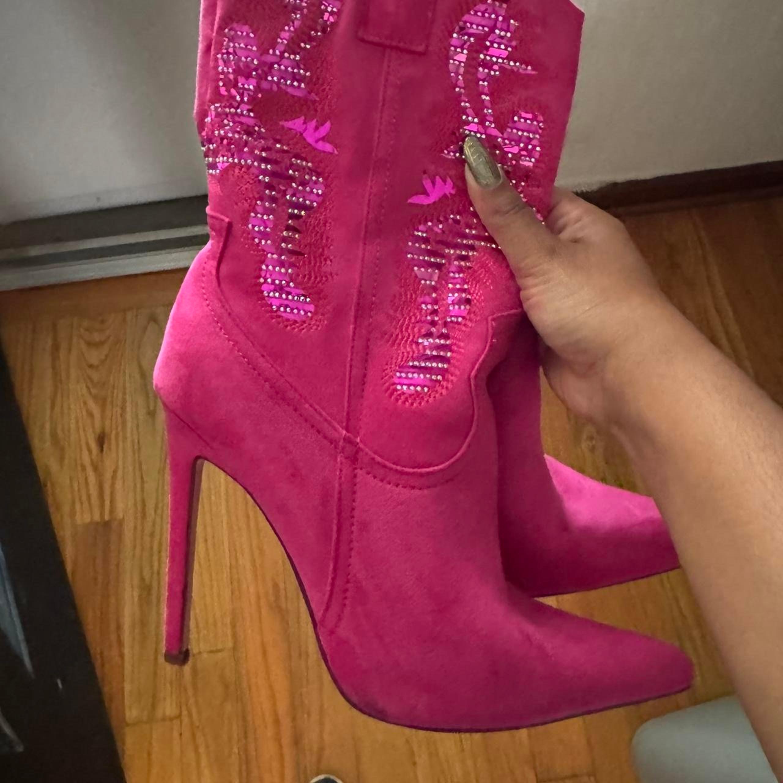 Pink cowgirl boots and hat