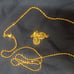 Gold necklace with butterfly charm