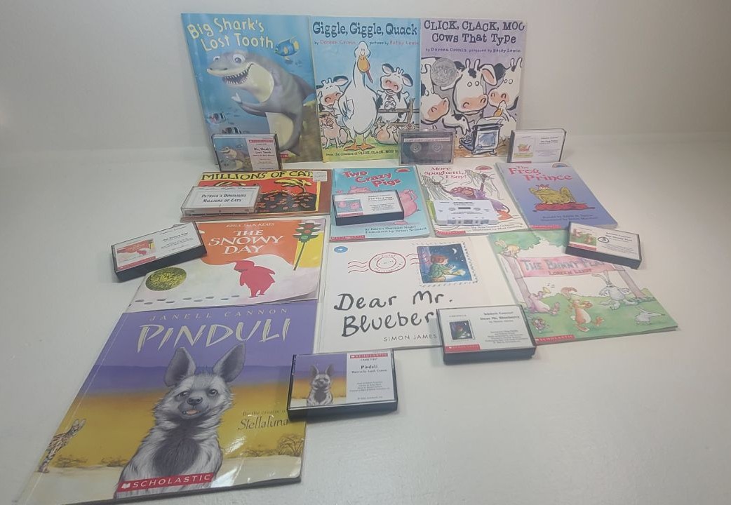 11 Scholastic reading books with Audio t