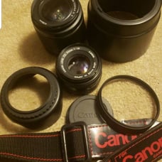 Canon lens, hoods, and strap bundle