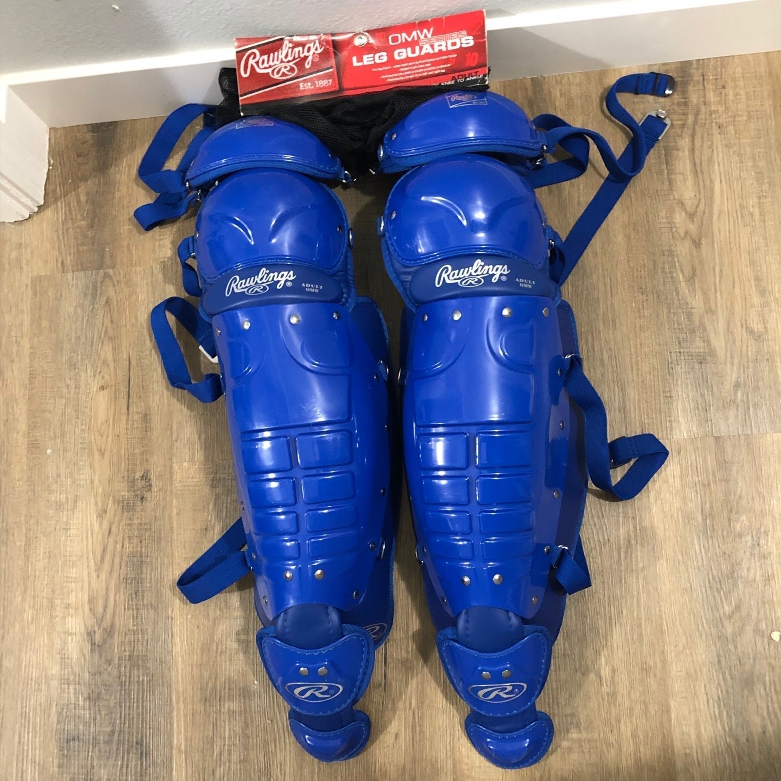 Rawlings OMW Series 5DCW-R 17.5” Royal Blue Adult Pro Padded Catcher Leg Guards.