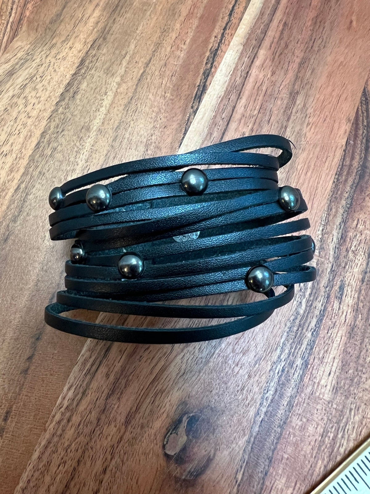 Fearlessly layered 2024 black bracelet