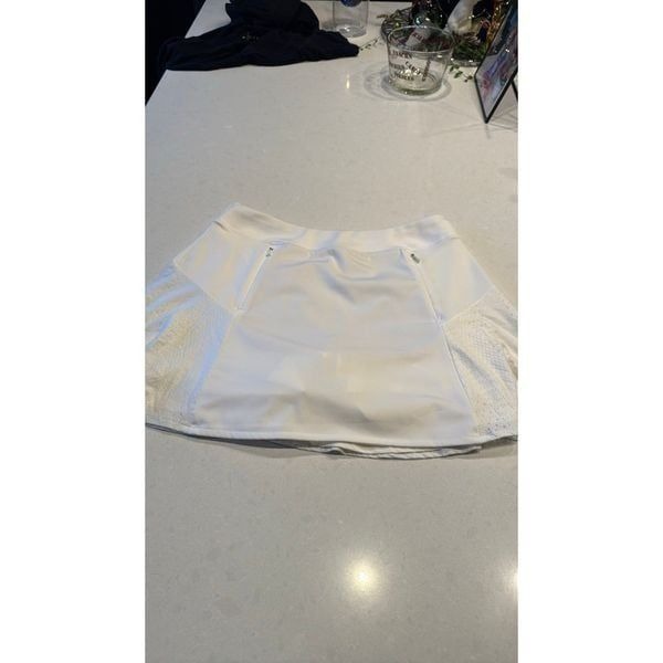 RLX women’s skort golf tennis skirt, size large, well made, excellent condition.