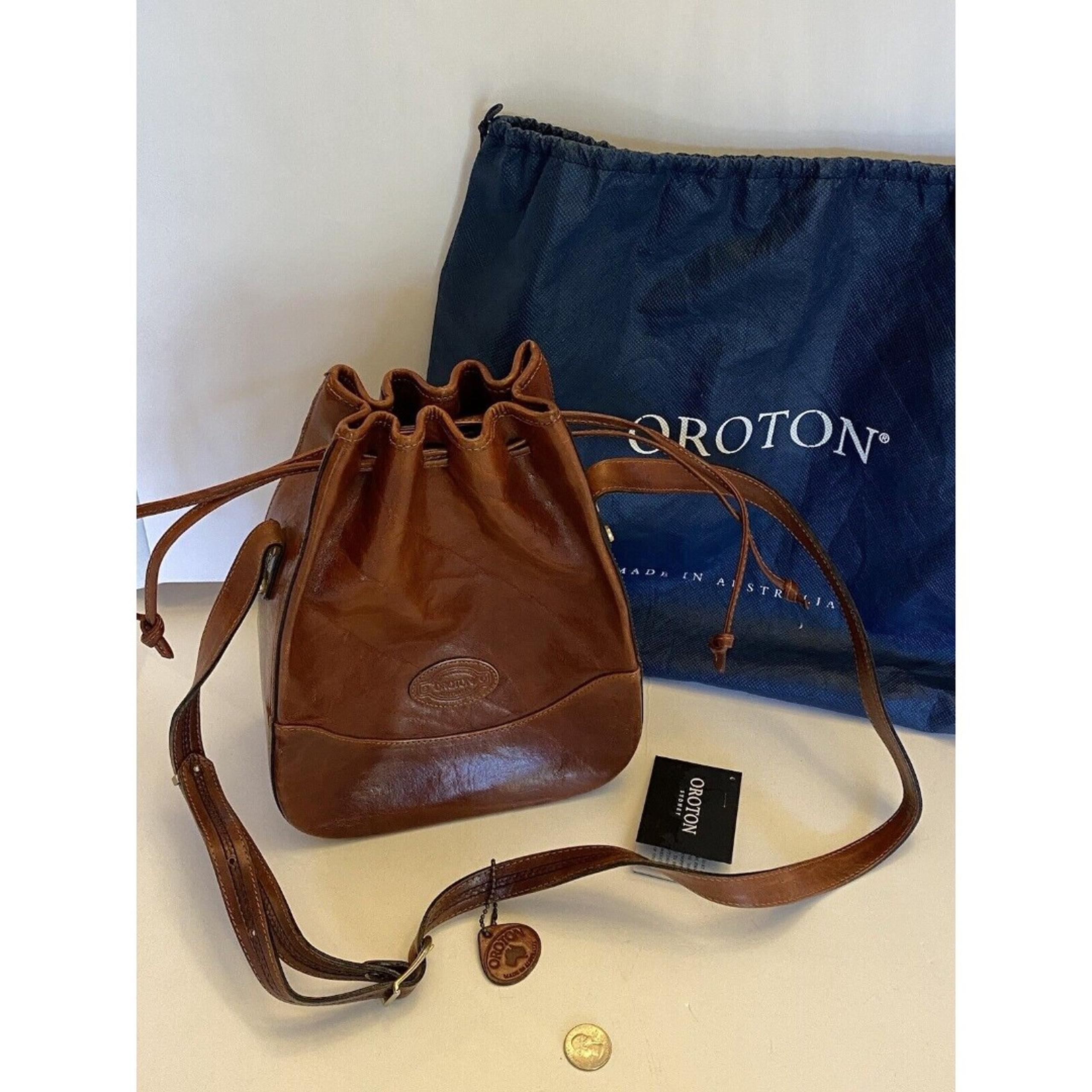 Oroton tan Leather Molded Drawstring luxury cowhide bucket Australian adjustable