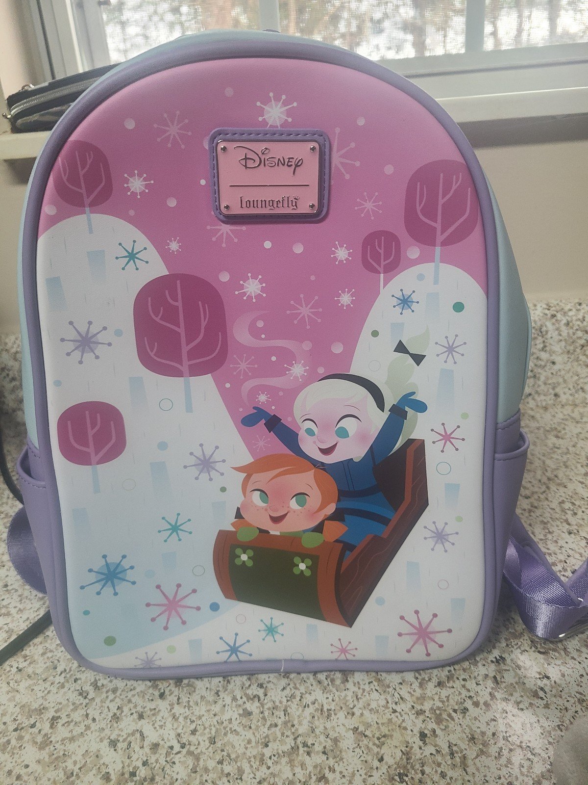 Loungefly Disney Frozen Anna and Elsa mini backpack