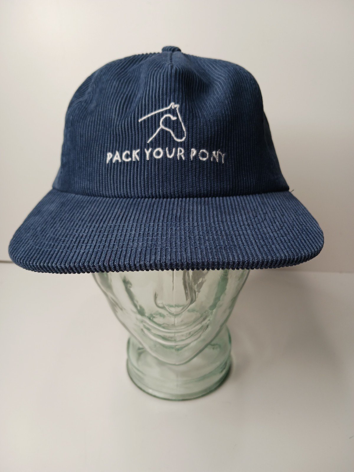 This navy cap is the perfect match for all the stunners out there. With its one-