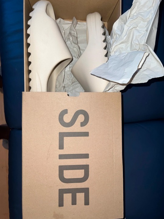 Yeezy slides Size 10 Men's slippers.