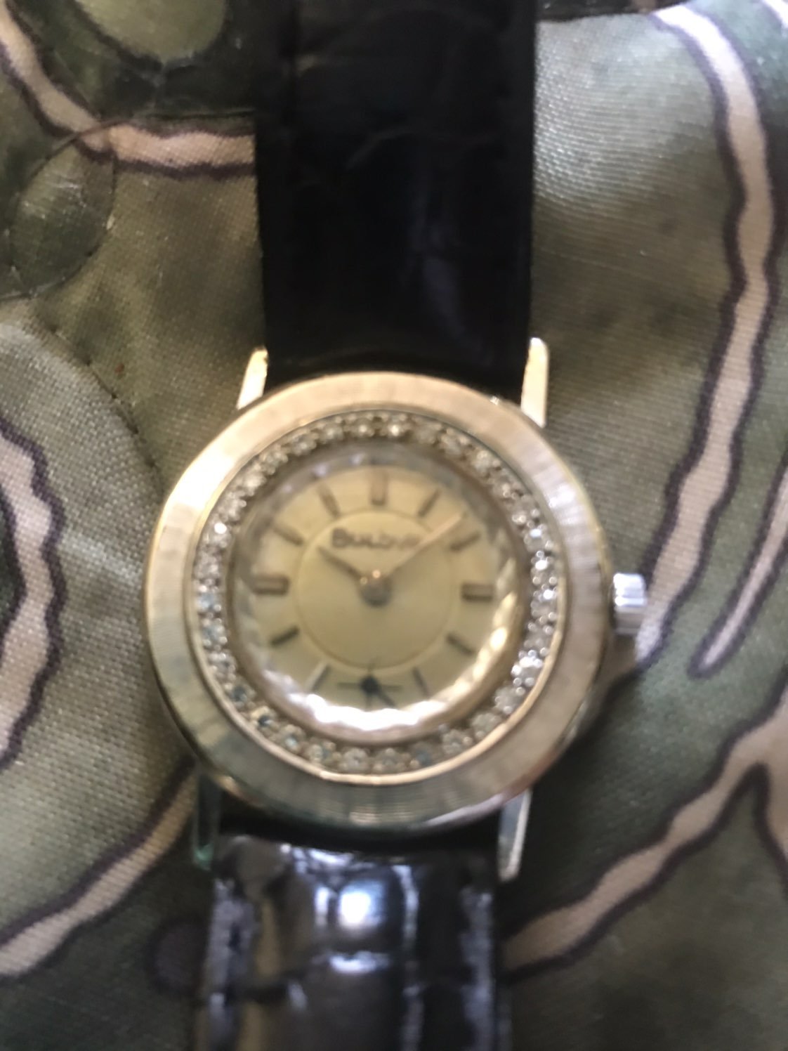 14kt gold vintage Bulova watch with diam