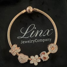 Linx Rose Gold Bracelet with Zircon Themed Charms