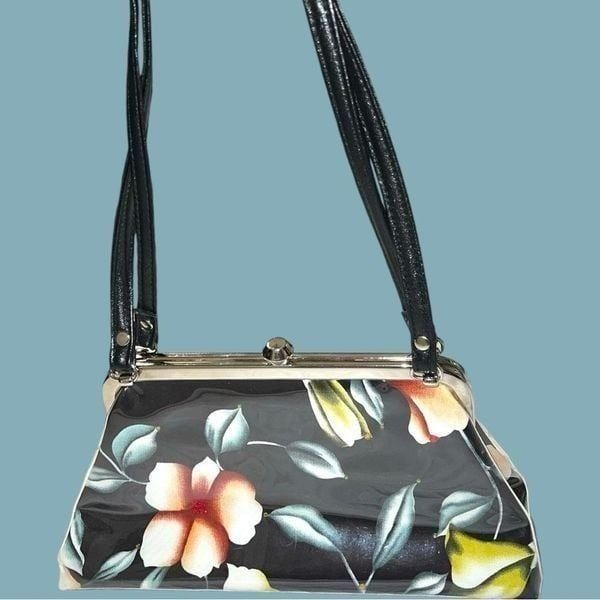 Adorable black patten leather look satchel white clasp closure!