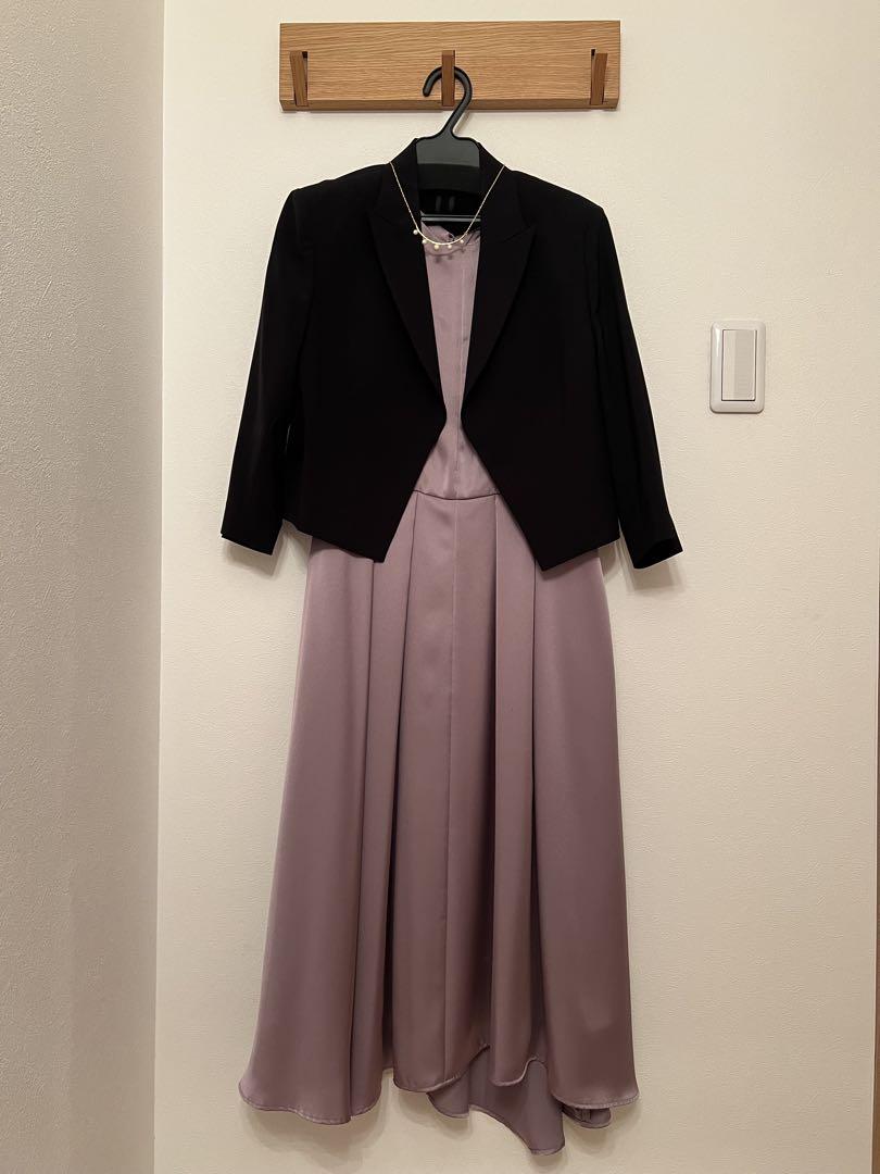 A light purple dress with a black jacket.